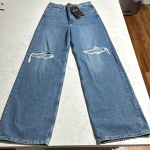 Levi’s high loose super high rise. Loose through. wide, straight leg